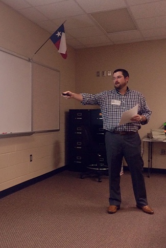 Houston Dentist Presenting in a Classroom